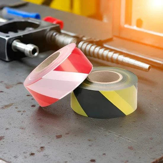 Adhesive hazard warning tape with high-visibility chevron pattern made from PVC film and rubber pressure-sensitive